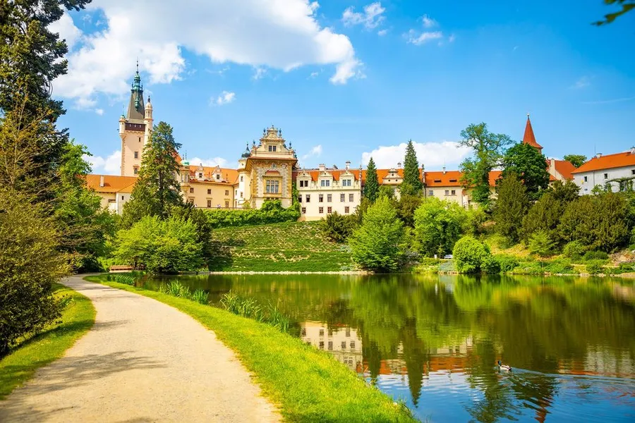 Large castle reflection pond spring time pruhonice czech